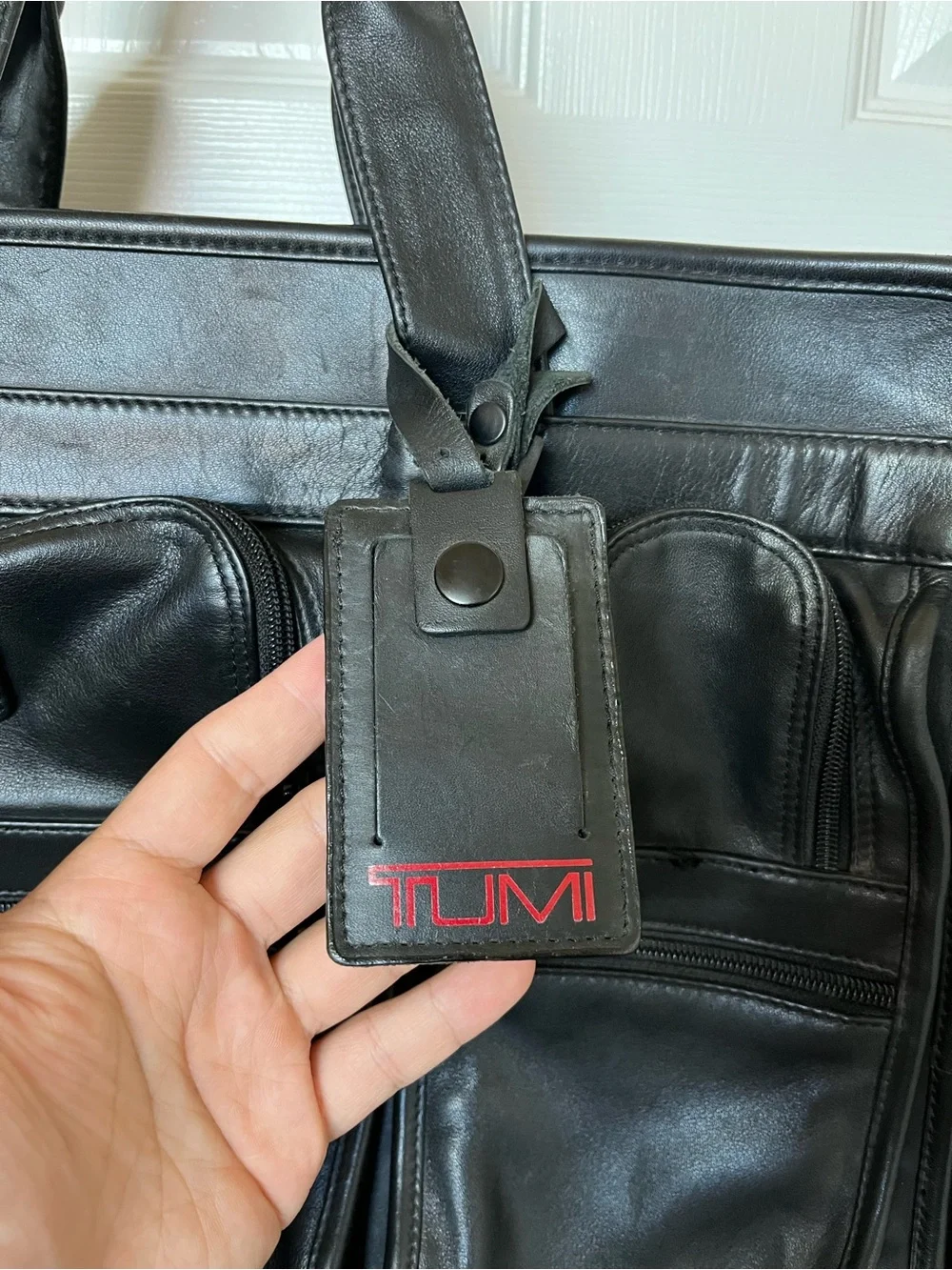 Tumi Black Leather Multi-Pocket Briefcase with Shoulder Strap